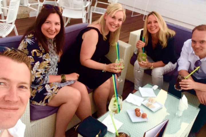 a group of people sitting at a table