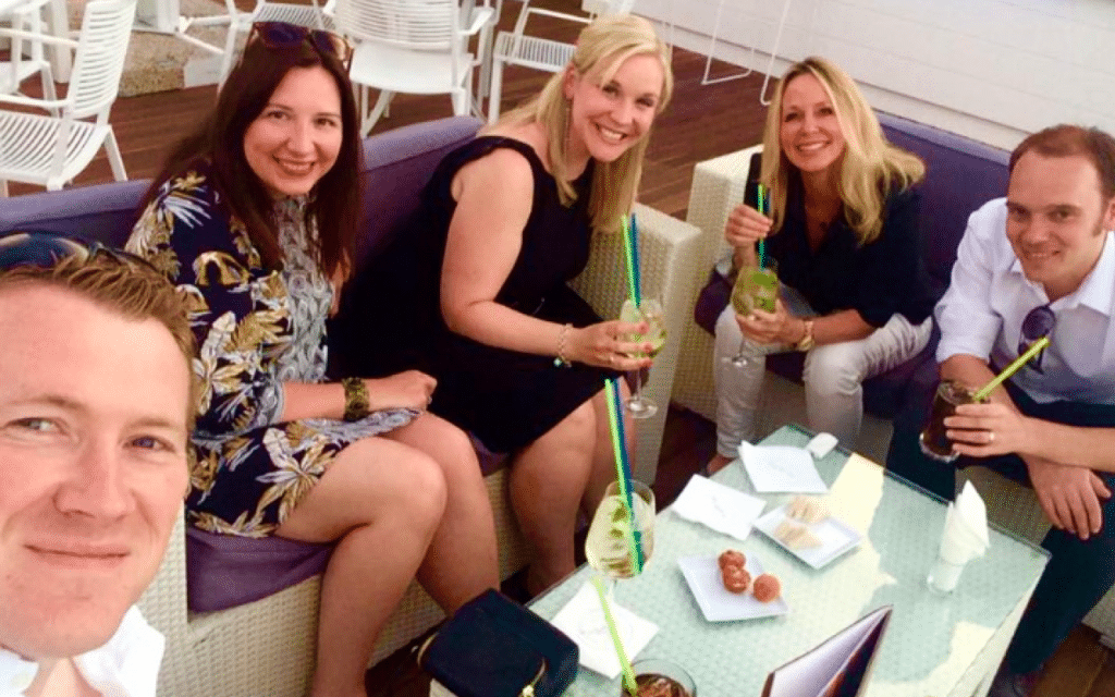 a group of people sitting at a table
