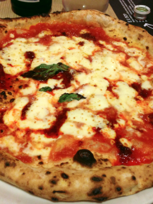 a pizza sitting on top of a table