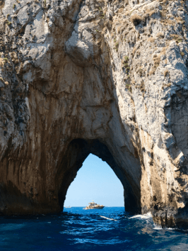 water next to the rock with Arch of Cabo San Lucas in the background